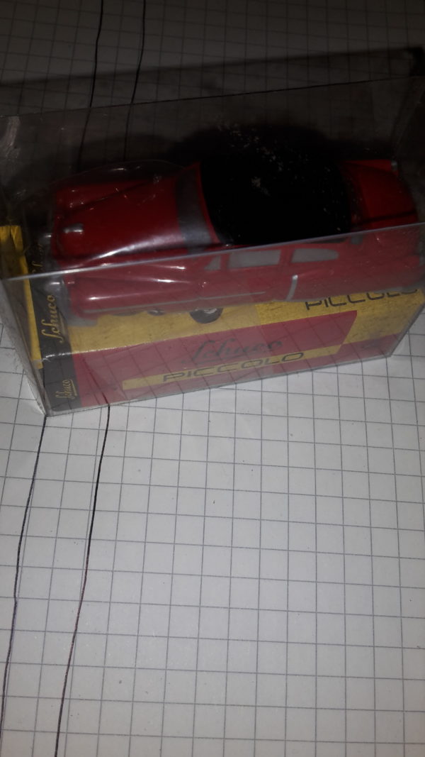 SCHUCO CADILLAC `54 ROT/SCHWARZ 1:90