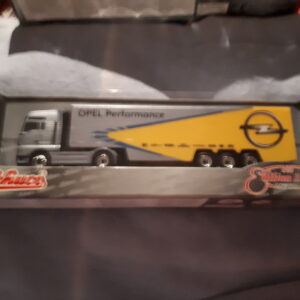 SCHUCO MAN TG-A KOFFERSATTELZUG m.SEITENVERKL.“OPEL PERFORMANCE“ 22637 1:87