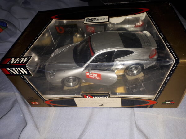 BURAGO GOLD EDITION PORSCHE 911 TURBO 1999,AUTO MOTOR SPORT VEREDELT NR.108,1:18