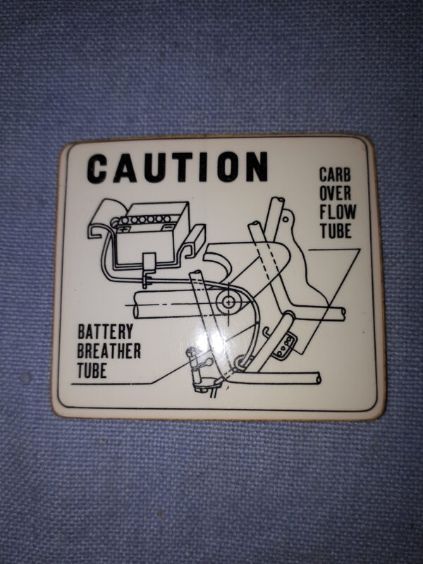 AUFKLEBER CAUTION CARB.OVER FLOW TUBE